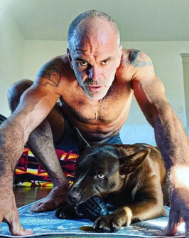 Steven Ogg with his pet dog 